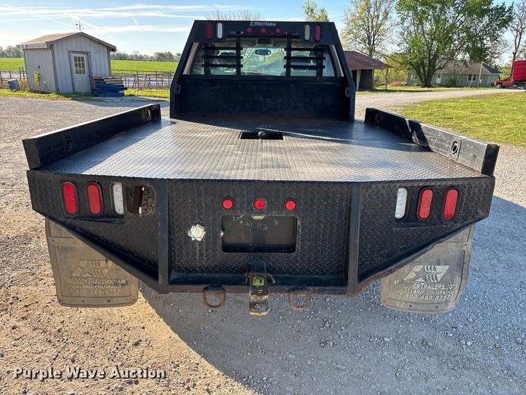 image for item FG0232 2005 Ford F350 Ext. Cab flatbed pickup truck