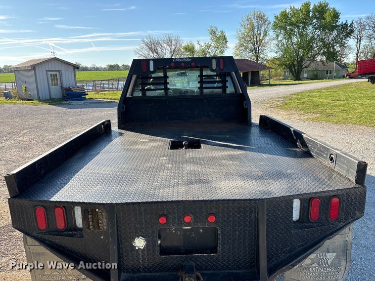 image for item FG0232 2005 Ford F350 Ext. Cab flatbed pickup truck