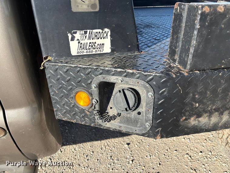 image for item FG0232 2005 Ford F350 Ext. Cab flatbed pickup truck