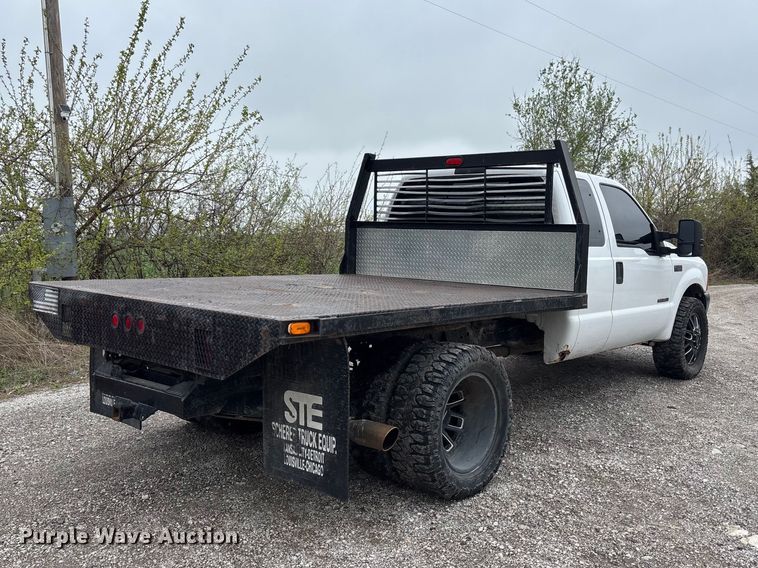 image for item FH7048 2000 Ford F350 Super Duty Ext. Cab flatbed pickup truck