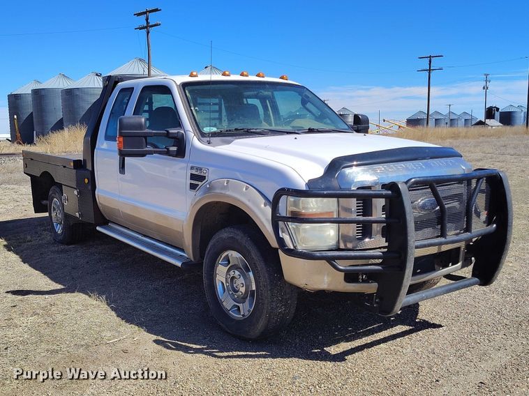 image for item IH9473 2008 Ford F350 Super Duty Ext. Cab flatbed pickup truck