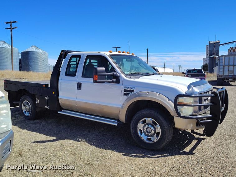image for item IH9473 2008 Ford F350 Super Duty Ext. Cab flatbed pickup truck