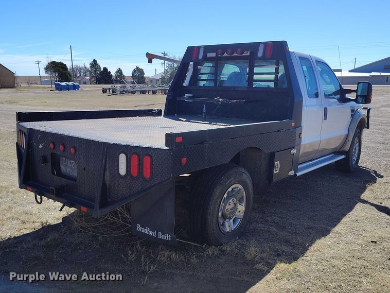 image for item IH9473 2008 Ford F350 Super Duty Ext. Cab flatbed pickup truck