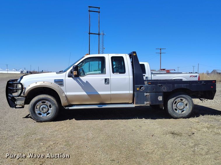image for item IH9473 2008 Ford F350 Super Duty Ext. Cab flatbed pickup truck