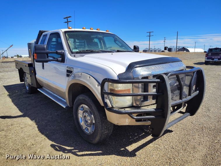 image for item IH9473 2008 Ford F350 Super Duty Ext. Cab flatbed pickup truck