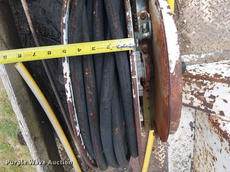 image for item DU3118 2000 Ford F750 digger derrick truck