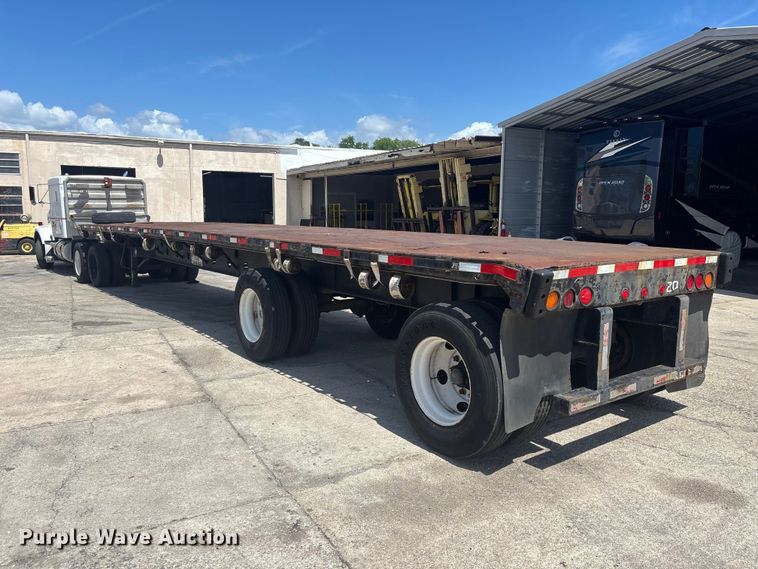 image for item EA5478 1999 Transcraft TL-2000 flatbed trailer
