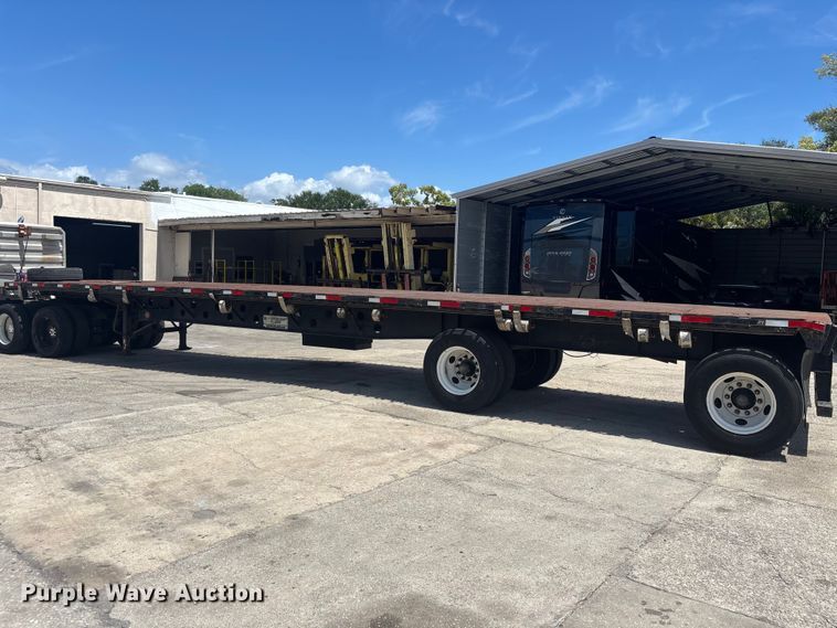 image for item EA5478 1999 Transcraft TL-2000 flatbed trailer