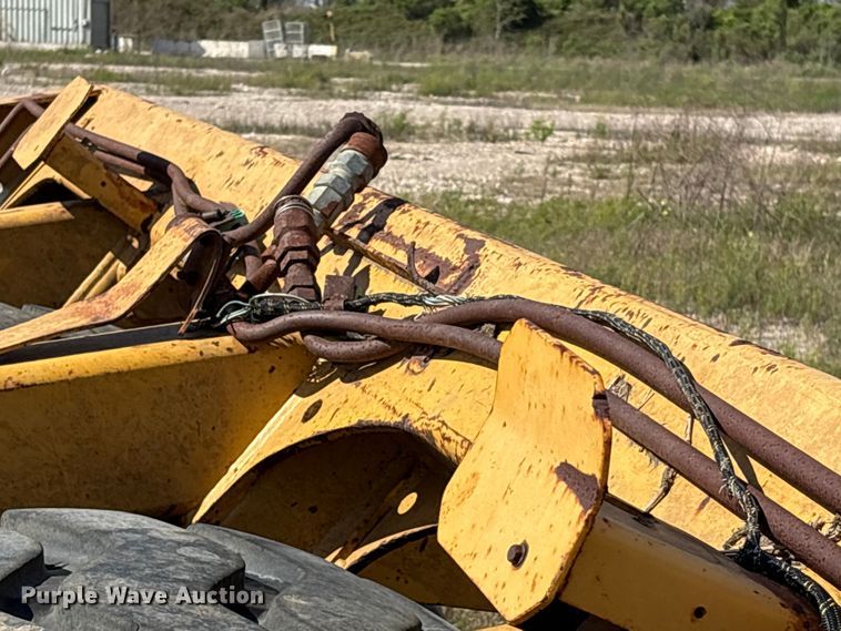 image for item EA7249 John Deere 1812C scraper