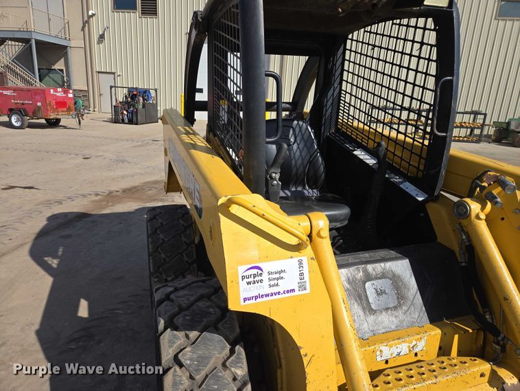 image for item EB1390 2000 John Deere 240 skid steer loader