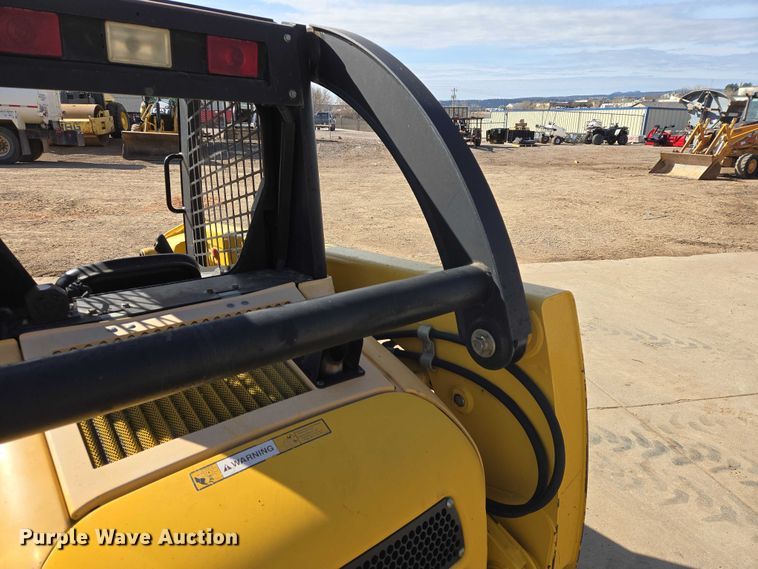 image for item EB1390 2000 John Deere 240 skid steer loader