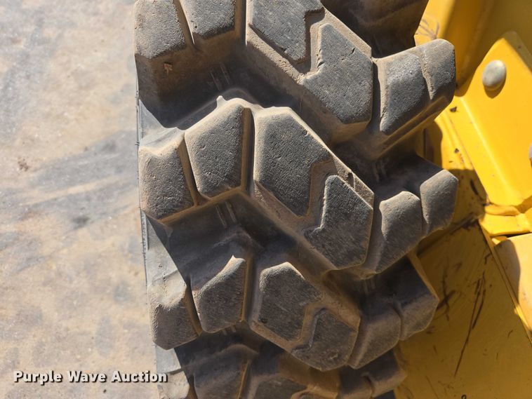 image for item EB1390 2000 John Deere 240 skid steer loader