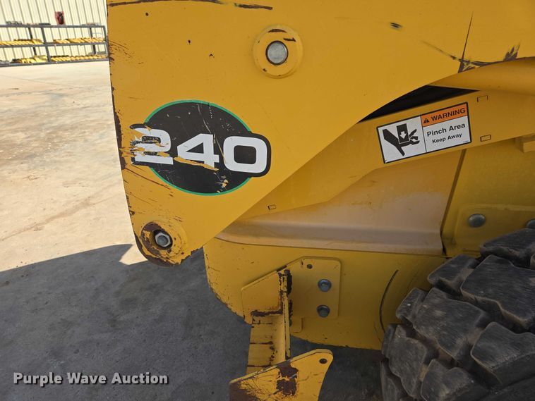 image for item EB1390 2000 John Deere 240 skid steer loader
