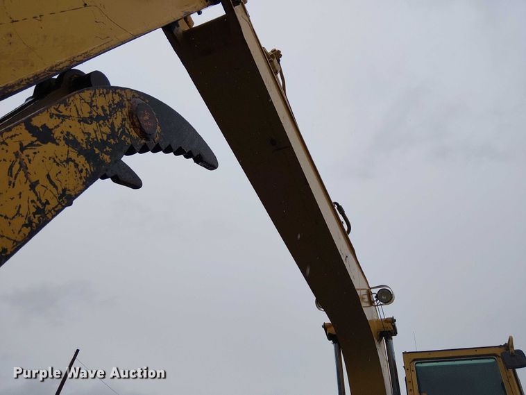 image for item EE5247 1988 Caterpillar 215 C excavator