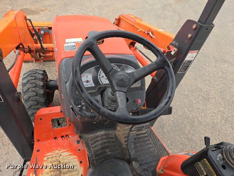 image for item EV5582 Kubota B26 HST backhoe