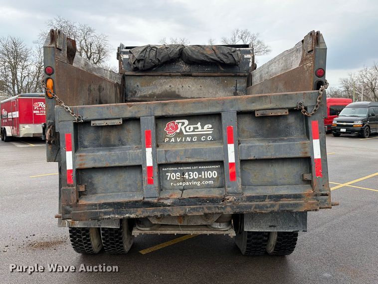 image for item FB8053 2002 Freightliner FL70 Crew Cab dump truck