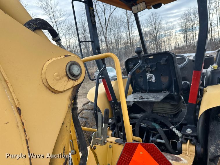 image for item FK1854 John Deere 110 backhoe