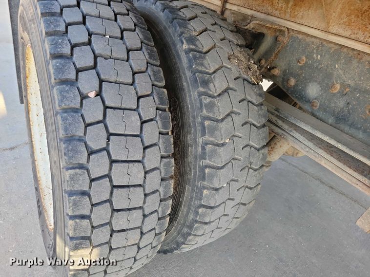 image for item NK9997 1993 GMC Top Kick flatbed truck