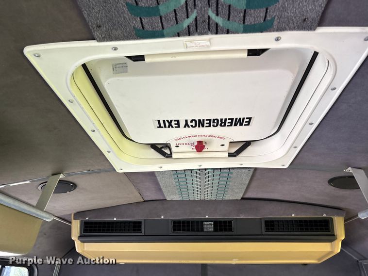 image for item DU0423 2002 Champion Freightliner FB65 shuttle bus