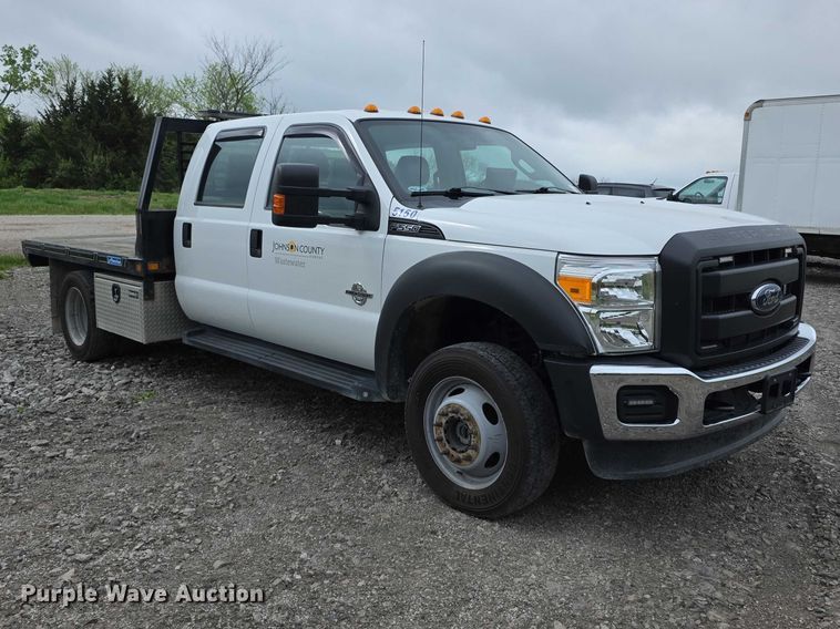 image for item FI0973 2015 Ford F550 Super Duty Crew Cab flatbed truck