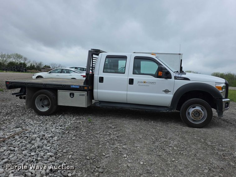 image for item FI0973 2015 Ford F550 Super Duty Crew Cab flatbed truck
