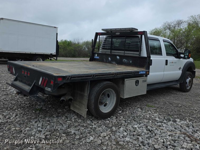 image for item FI0973 2015 Ford F550 Super Duty Crew Cab flatbed truck