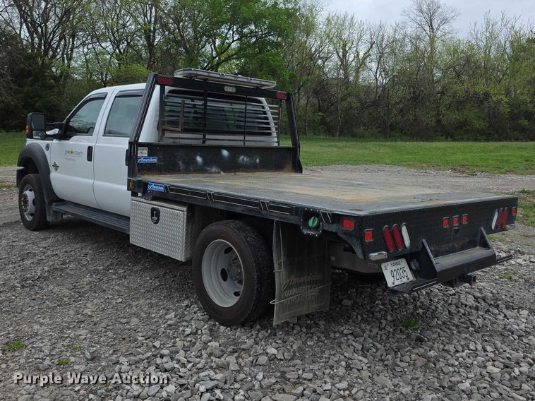 image for item FI0973 2015 Ford F550 Super Duty Crew Cab flatbed truck