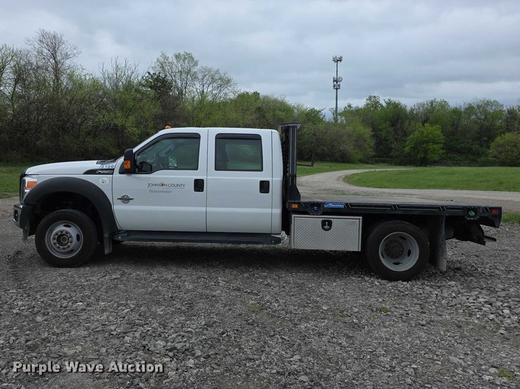 image for item FI0973 2015 Ford F550 Super Duty Crew Cab flatbed truck