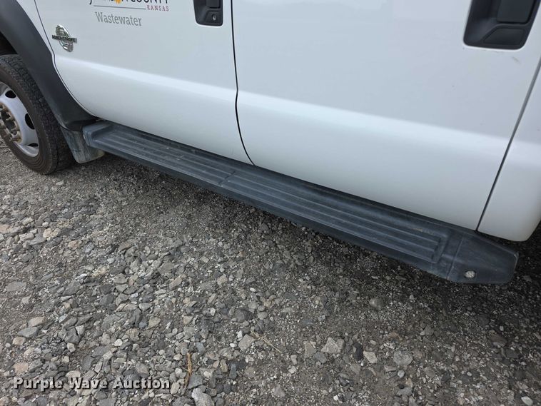 image for item FI0973 2015 Ford F550 Super Duty Crew Cab flatbed truck