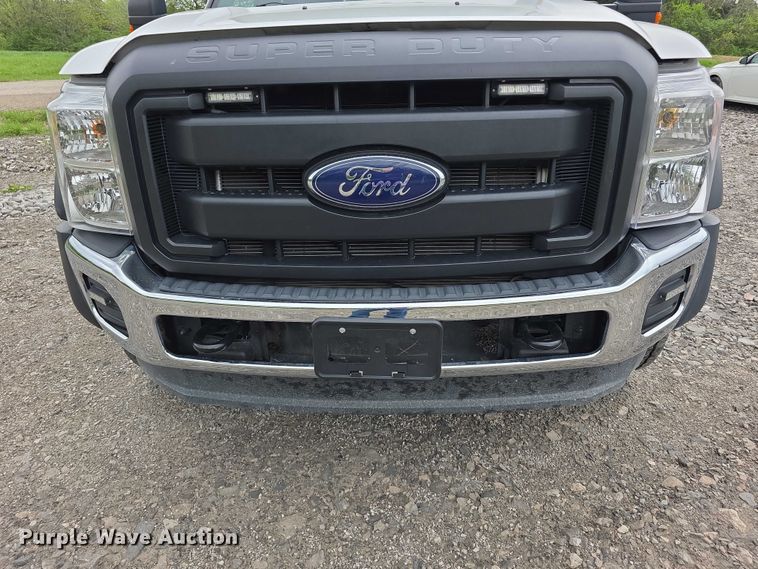 image for item FI0973 2015 Ford F550 Super Duty Crew Cab flatbed truck