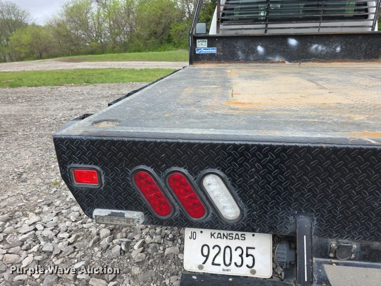 image for item FI0973 2015 Ford F550 Super Duty Crew Cab flatbed truck