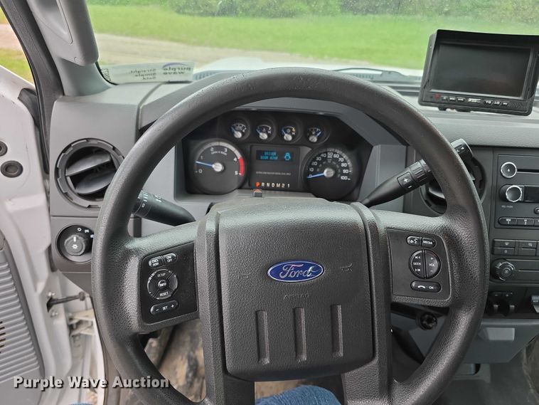 image for item FI0973 2015 Ford F550 Super Duty Crew Cab flatbed truck