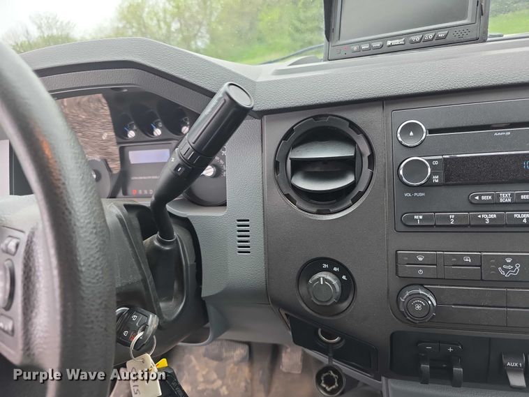 image for item FI0973 2015 Ford F550 Super Duty Crew Cab flatbed truck