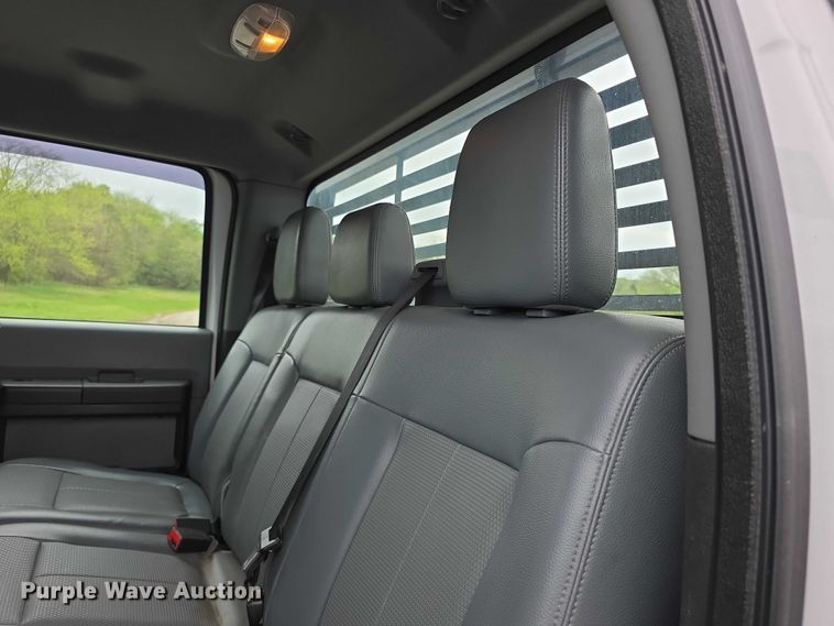 image for item FI0973 2015 Ford F550 Super Duty Crew Cab flatbed truck