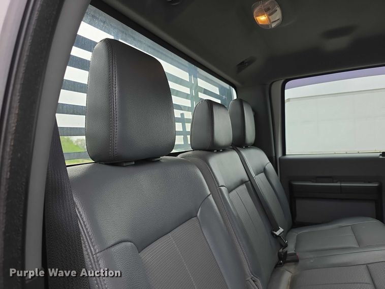 image for item FI0973 2015 Ford F550 Super Duty Crew Cab flatbed truck