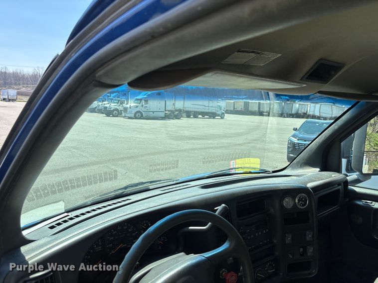 image for item EM8609 2003 Chevrolet C5500 flatbed truck