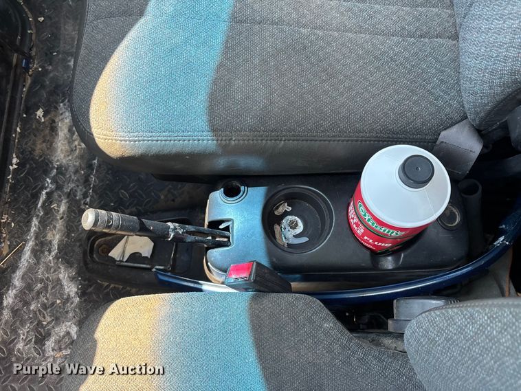 image for item EM8609 2003 Chevrolet C5500 flatbed truck