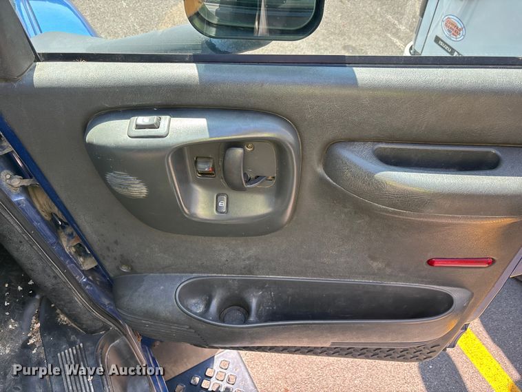 image for item EM8609 2003 Chevrolet C5500 flatbed truck