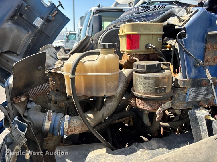 image for item EM8609 2003 Chevrolet C5500 flatbed truck