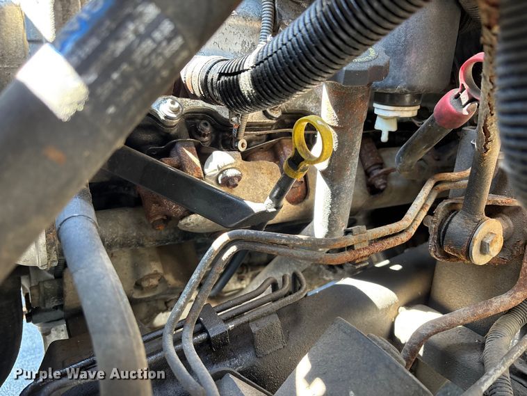 image for item EM8609 2003 Chevrolet C5500 flatbed truck