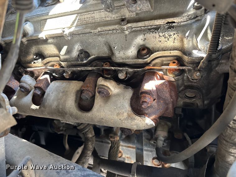 image for item EM8609 2003 Chevrolet C5500 flatbed truck