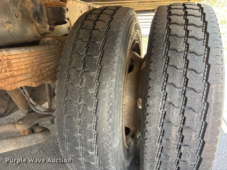 image for item EM8609 2003 Chevrolet C5500 flatbed truck