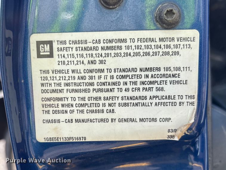 image for item EM8609 2003 Chevrolet C5500 flatbed truck