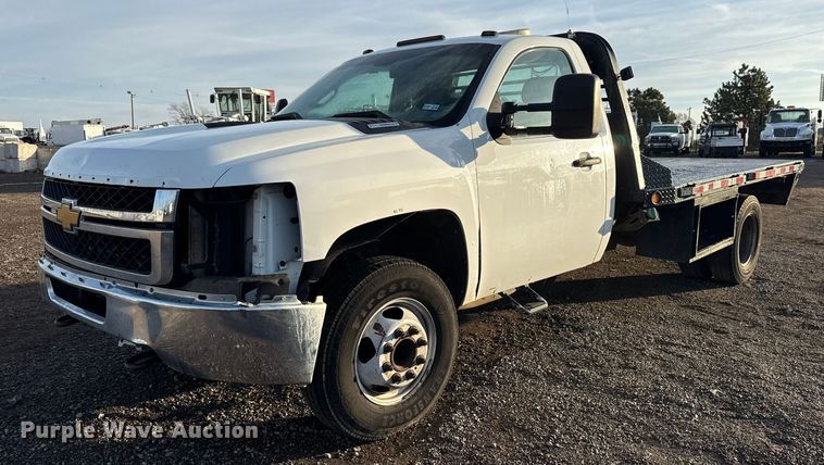 image for item EG1912 2013 Chevrolet Silverado 3500HD flatbed pickup truck
