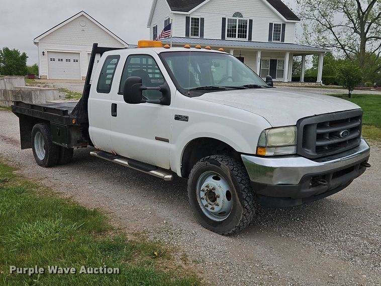 image for item EO7254 2004 Ford F450 Super Duty Ext. Cab flatbed pickup truck
