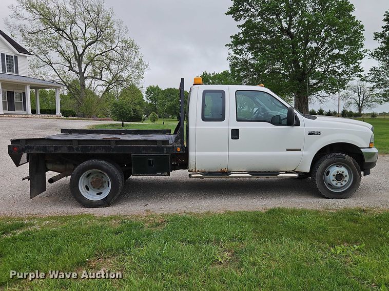 image for item EO7254 2004 Ford F450 Super Duty Ext. Cab flatbed pickup truck