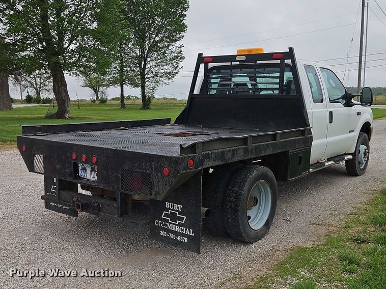 image for item EO7254 2004 Ford F450 Super Duty Ext. Cab flatbed pickup truck