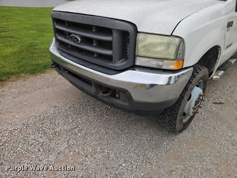 image for item EO7254 2004 Ford F450 Super Duty Ext. Cab flatbed pickup truck