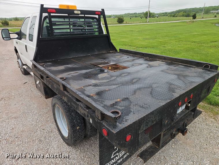 image for item EO7254 2004 Ford F450 Super Duty Ext. Cab flatbed pickup truck