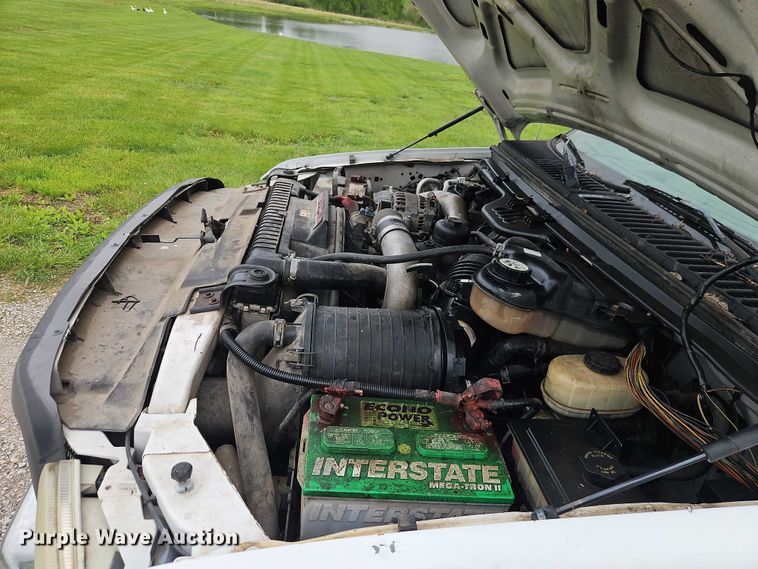 image for item EO7254 2004 Ford F450 Super Duty Ext. Cab flatbed pickup truck